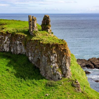 Dunseverick Castle in County Antrim, Northern Ireland. Located near the small village of Dunseverick and the Giant's Causeway. Dunseverick Castle and earthworks are Scheduled Historic Monuments in the Moyle District Council area. Dunseverick Castle and the peninsula on which it stands were given to the National Trust in 1962 by local farmer Jack McCurdy.